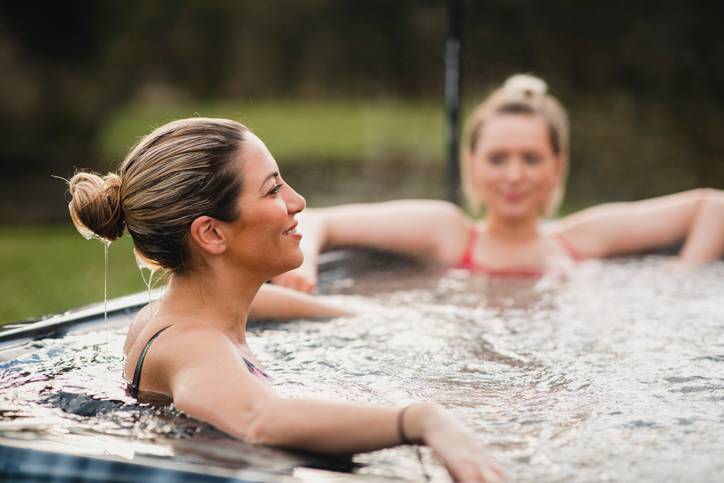 Adults Inside A Hot Tub