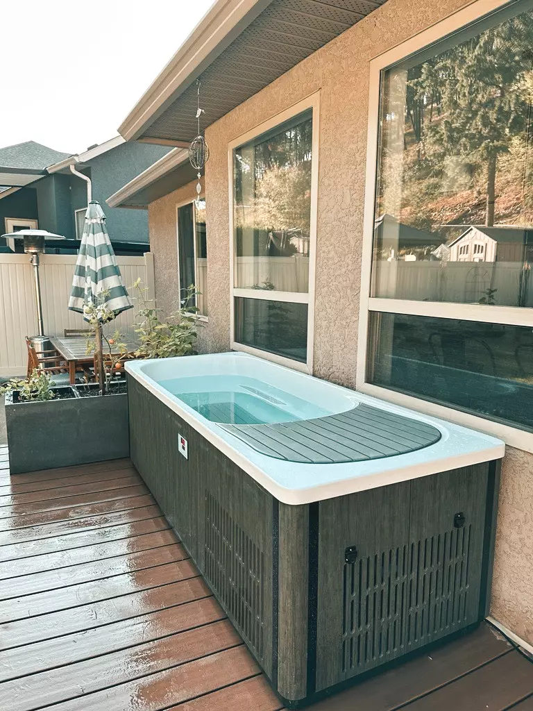 Kodiak cold plunge therapy tub in a backyard